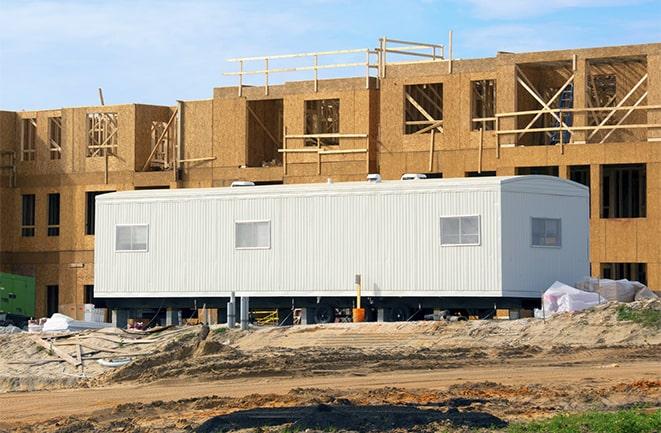 construction office rentals with signage for leasing information in Aurora, IL